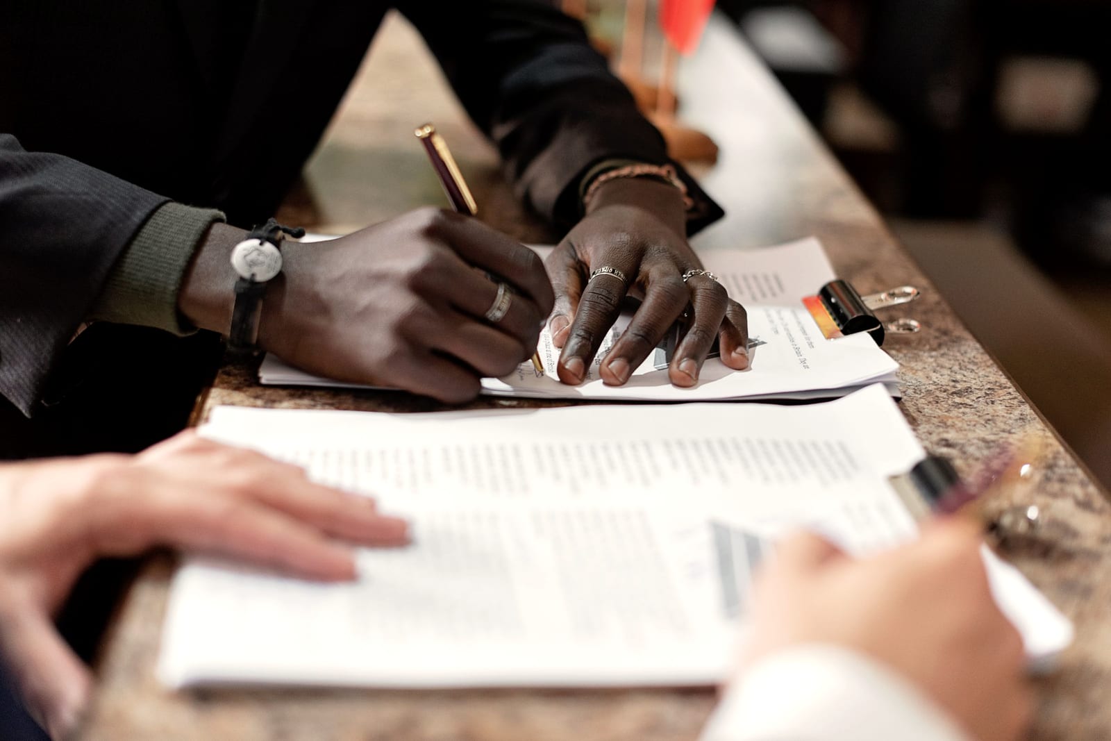 Two people going through paperwork together